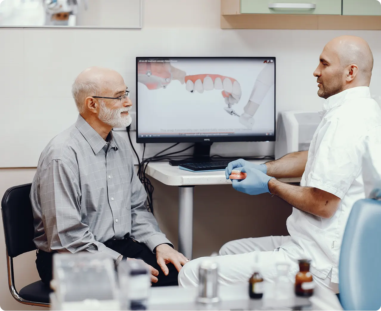 Old man sitting at dentists office